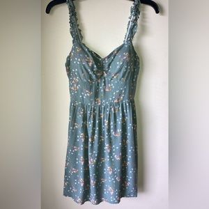 Floral green As U Wish dress w/ built in padding. Size Medium